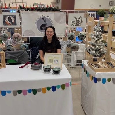 Cinnamon Teal Handmade booth at a craft fair