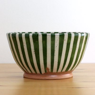 Green-striped ceramic bowl
